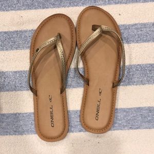 Simple gold strap flip-flops